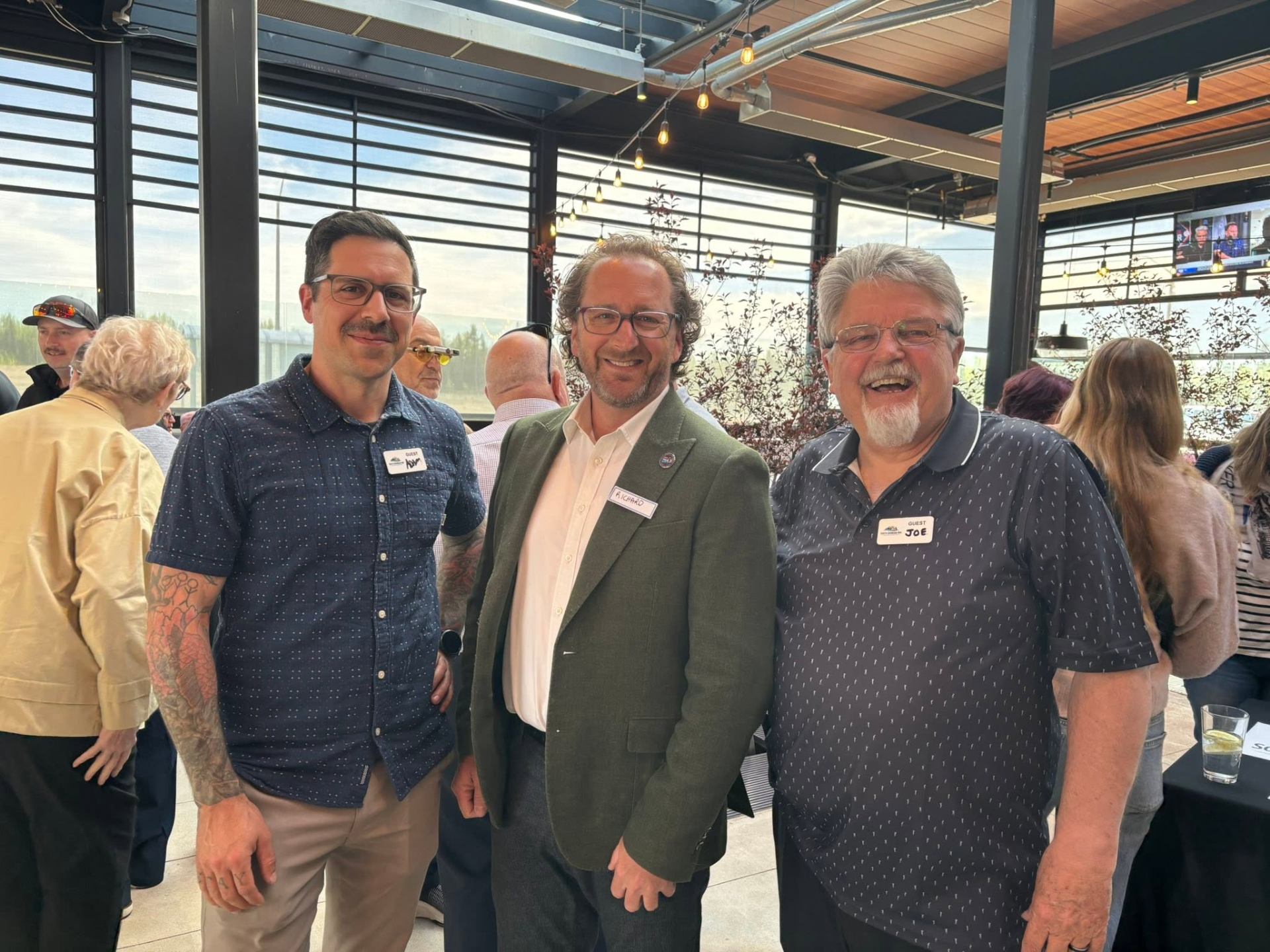Joe Belanger with fellow community leaders at a local event