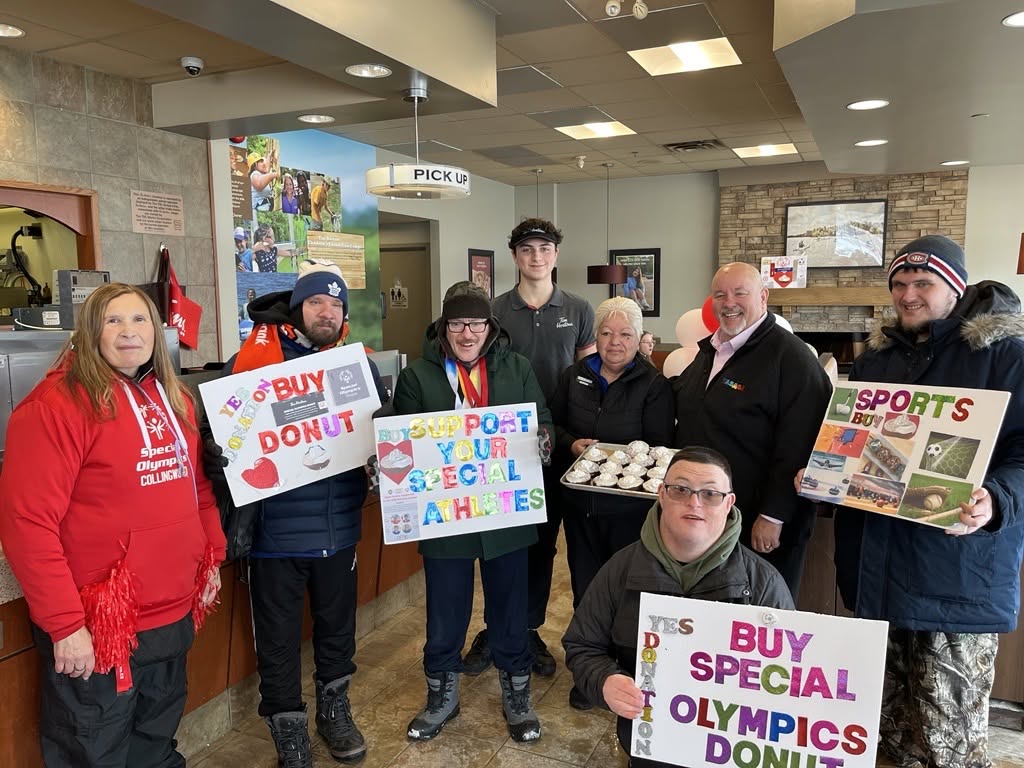 Brian Smith supporting Special Olympics volunteers